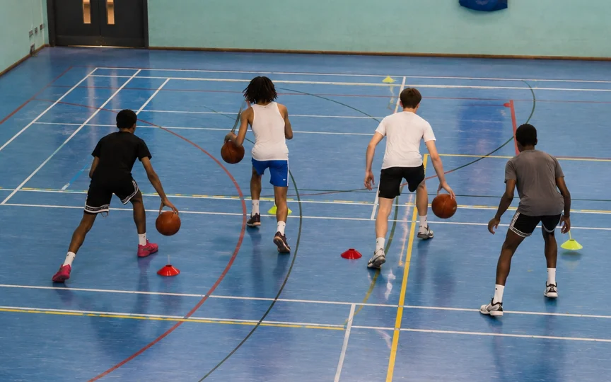 A small group of players training together in a competitive session